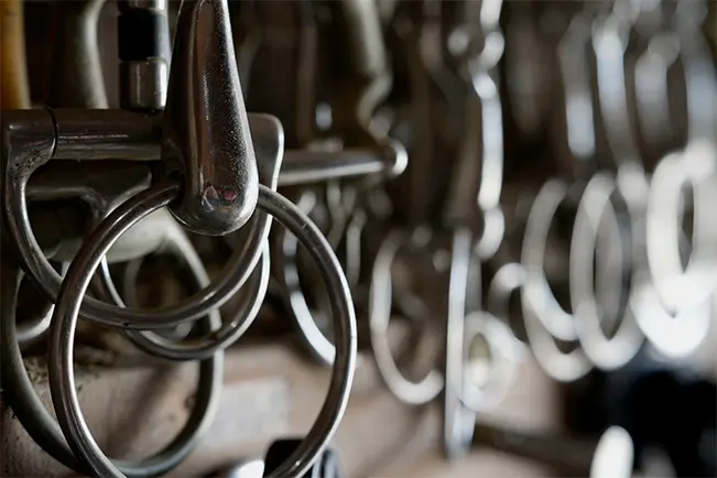 Close-up of metal rings and hooks with a shallow depth of field