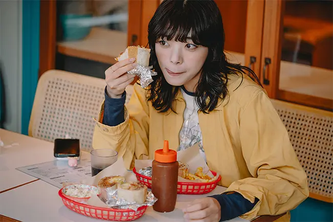 Woman eating at a restaurant