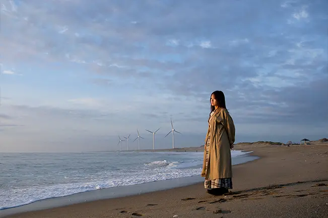 Person standing by the ocean