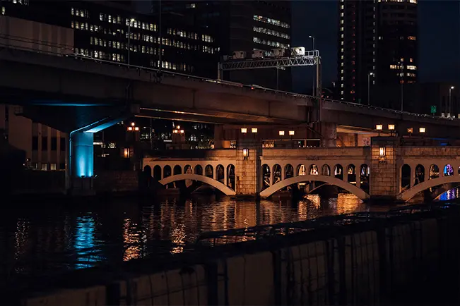 Bridge and waterfront at night
