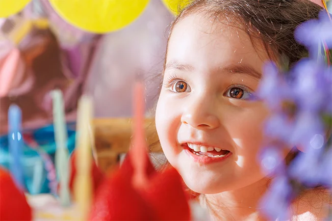 Child enjoying colorful toys