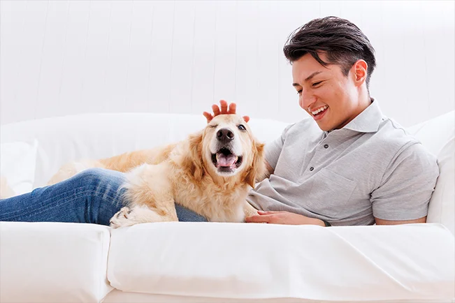 Man relaxing with a dog